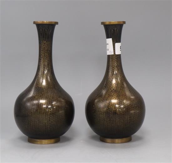 A pair of Chinese black ground cloisonne enamel bottle vases, mid 20th century height 24cm